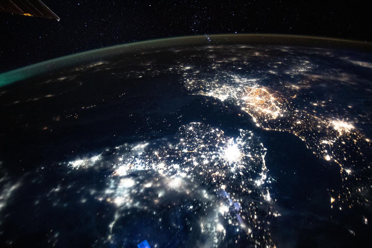 iss065e385457 (Sept. 15, 2021) --- The International Space Station was orbiting 265 miles above the north Atlantic Ocean when an Expedition 65 crew member captured this photograph of the city lights of England, The Netherlands, Belgium and France.