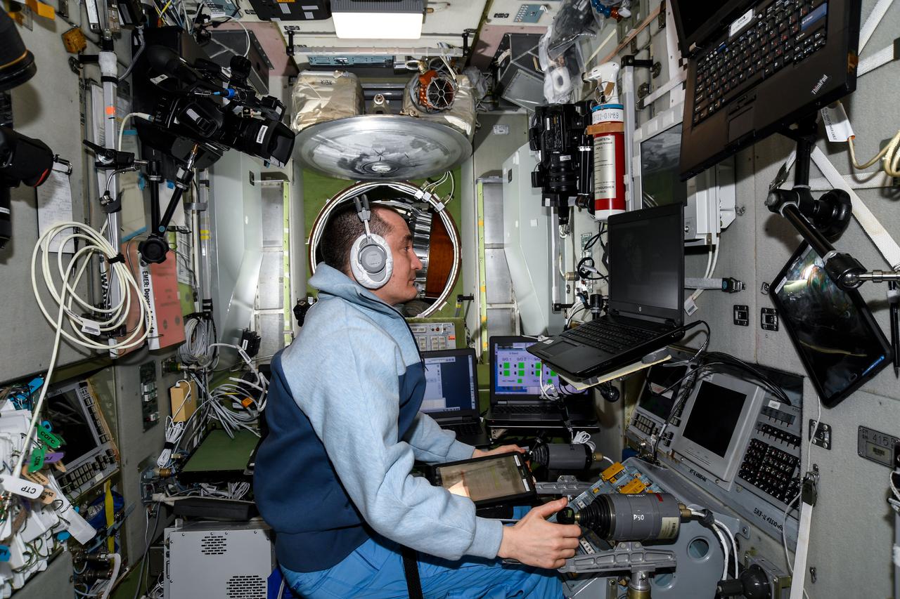 iss065e415942 (Sept. 24, 2021) --- Roscosmos cosmonaut and Expedition 65 Flight Engineer Pyotr Dubrov is inside the Zvezda service module training on a computer for the maneuvers he would use during the relocation of the Soyuz MS-18 crew ship from the Rassvet module to the Nauka multipurpose laboratory module several days later.