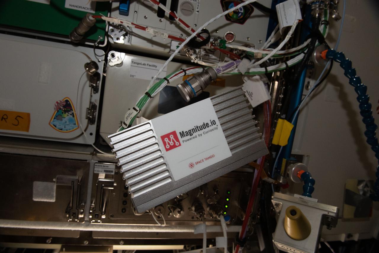 iss065e423763 (9/27/2021) --- A view of the Symbiotic Leguminous Nitrogen Fixation CubeLab onboard the International Space Station (ISS). Nitrogen Fixation of Leguminous Species in MicroG (Symbiotic Leguminous Nitrogen Fixation) explores microgravity’s effects on the growth and development of Vigna unguiculata, a legume capable of biological nitrogen fixation.