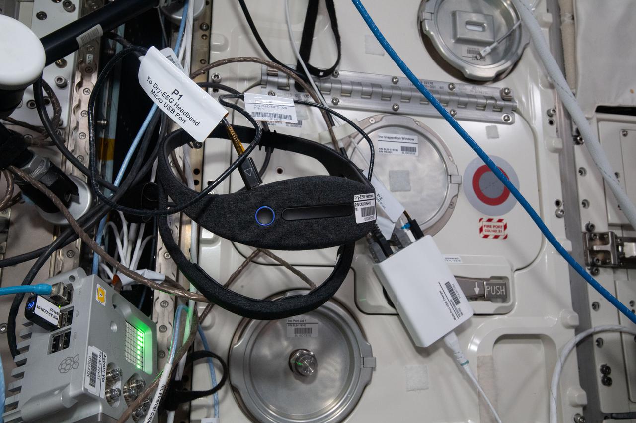 iss065e423775 (9/20/2021) --- A view of the Sleep Monitoring in Space with Dry-EEG Headband (Dreams) hardware in the Columbus module aboard the International Space Station (ISS). Dreams is a technology demonstration investigation that utilizes the Dry-EEG Headband: an effective, affordable, and comfortable solution to monitor astronaut sleep quality during long-duration spaceflight aboard the International Space Station (ISS).