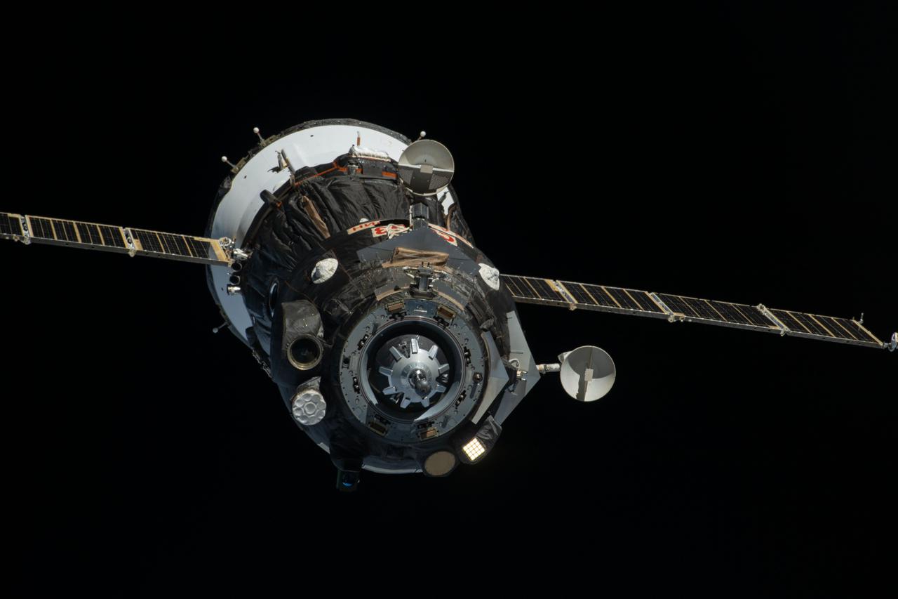 iss065e431136 (Sept. 28, 2021) --- The Soyuz MS-18 spacecraft carrying three Expedition 65 crewmates is pictured during its relocation maneuver from the Rassvet module to the Nauka multipurpose laboratory module.