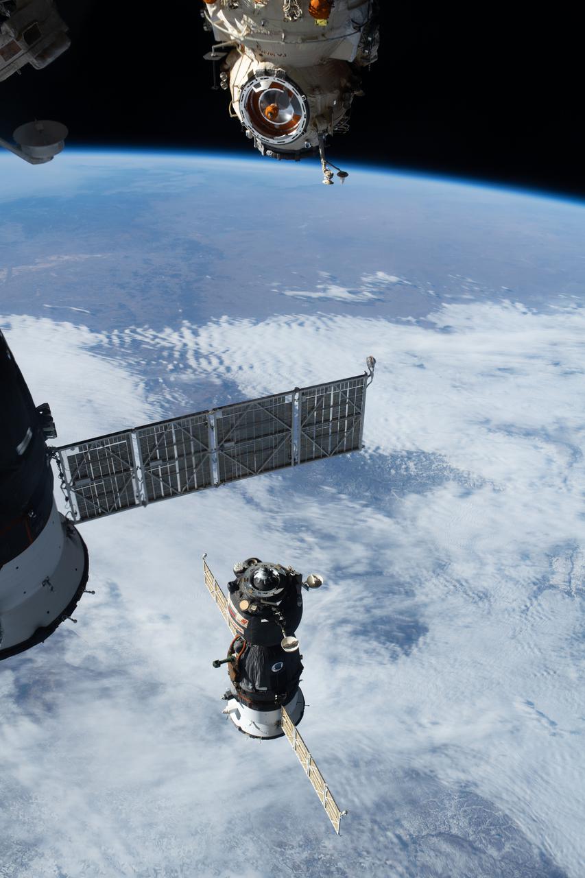 iss066e000920 (Oct. 17, 2021) --- The Soyuz MS-18 crew ship undocks from the Nauka multipurpose laboratory module and departs the International Space Station as both spacecraft were orbiting 263 miles above the eastern China-Russia border.