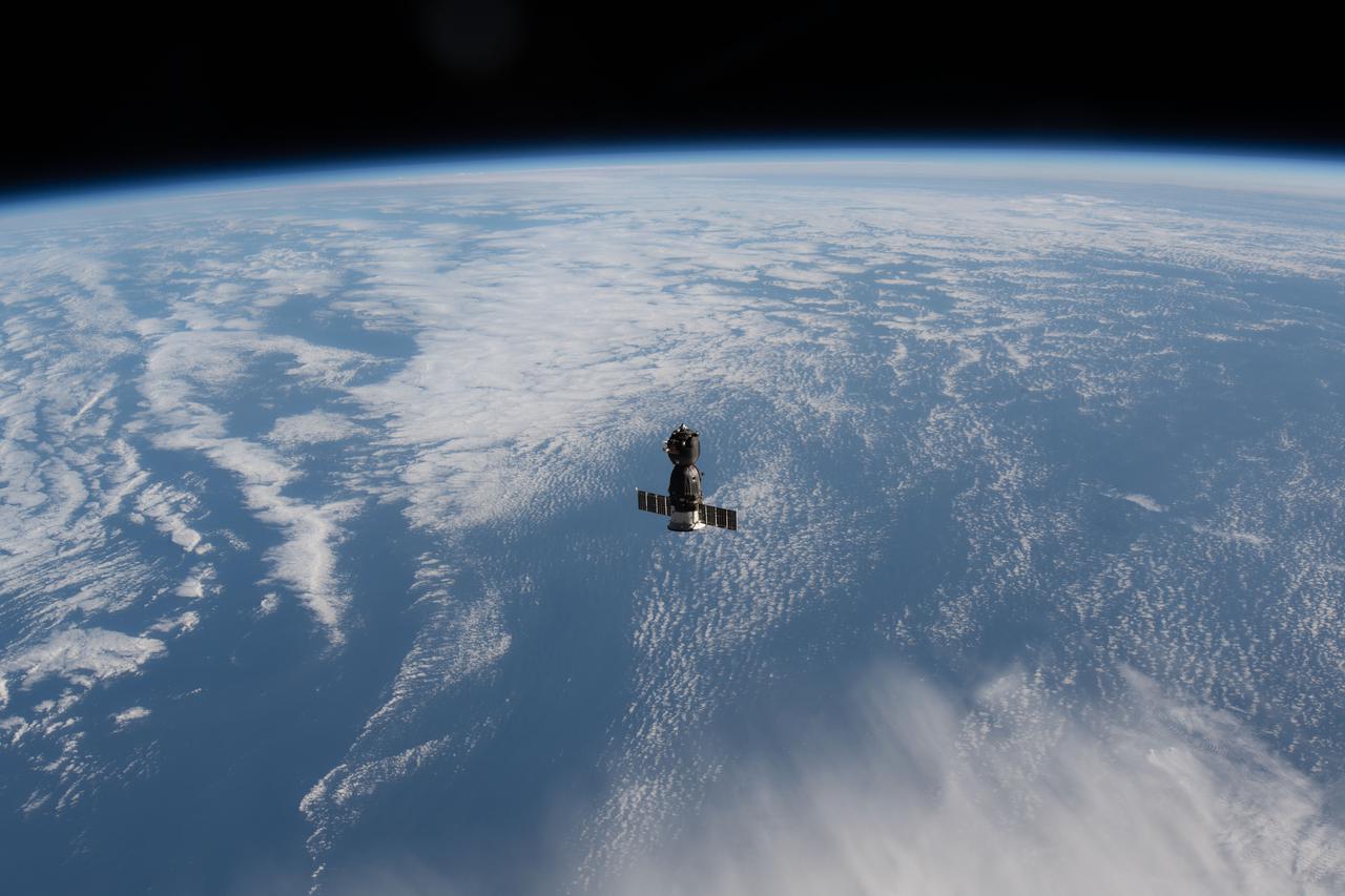 iss066e001149 (Oct. 17, 2021) --- The Soyuz MS-18 crew ship, carrying Soyuz Commander Oleg Novitskiy and spaceflight participants Yulia Peresild and Klim Shipenko, is pictured departing the vicinity of the International Space Station as both spacecraft were orbiting 263 miles above far eastern Russia.