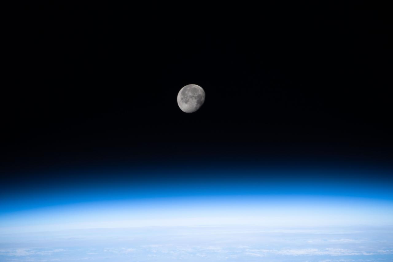 iss066e010452 (Oct. 24, 2021) --- The waning gibbous Moon is pictured above the Earth's horizon as the International Space Station orbited 262 miles above eastern China.