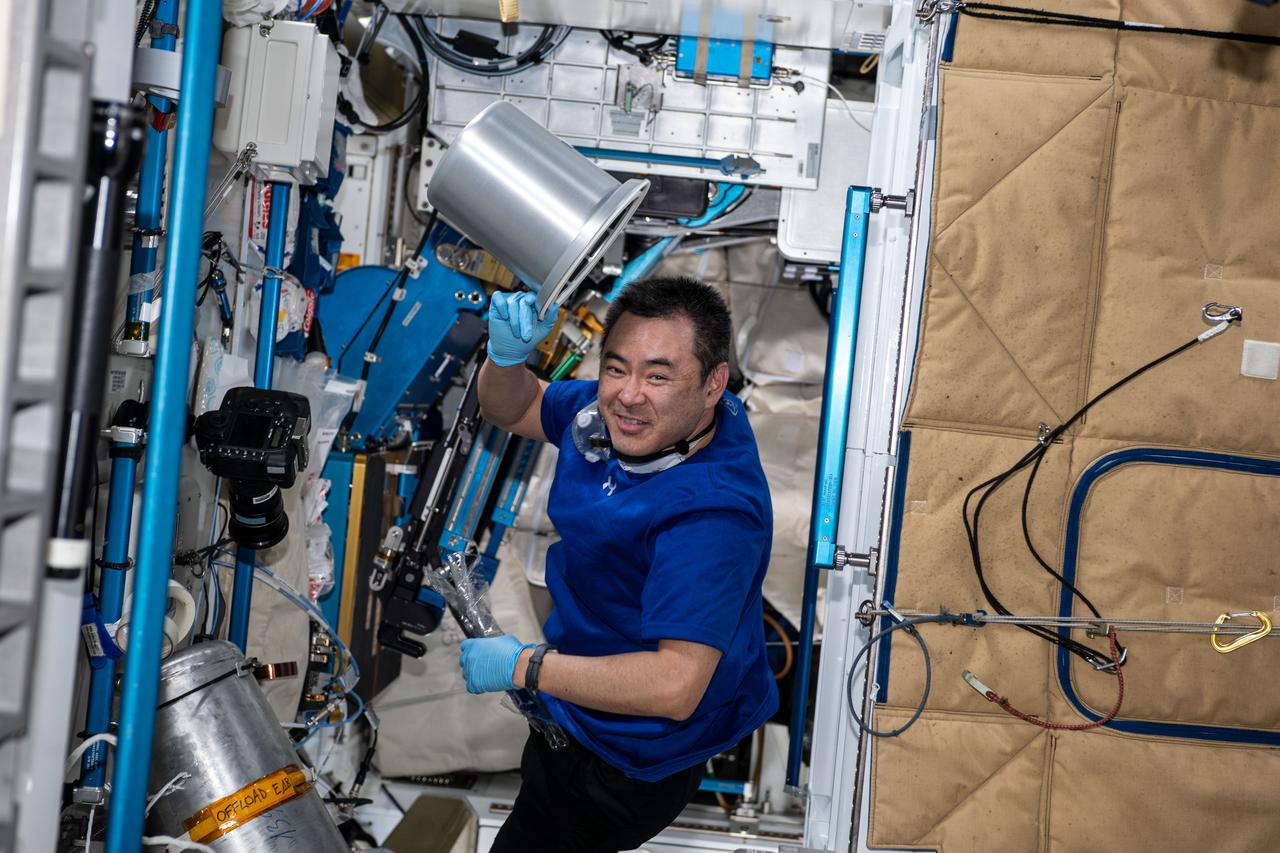 iss066e044523 (Nov. 4, 2021) --- Japan Aerospace Exploration Agency (JAXA) astronaut and Expedition 66 Flight Engineer Akihiko Hoshide works on orbital plumbing tasks inside the International Space Station's Tranquility module.