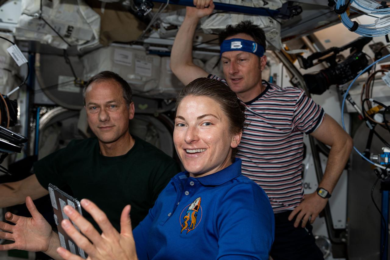 iss066e077795 (Nov. 16, 2021) --- From left, Flight Engineers Thomas Marshburn, Kayla Barron and Matthias Maurer review spacewalk procedures. NASA astronauts Marshburn and Barron are scheduled to conduct a six-and-a-half-hour spacewalk to replace an antenna system on the International Space Station's Port-1 truss structure. ESA (European Space Agency) astronaut Maurer will operate the Canadarm2 robotic arm assisting the two spacewalkers.