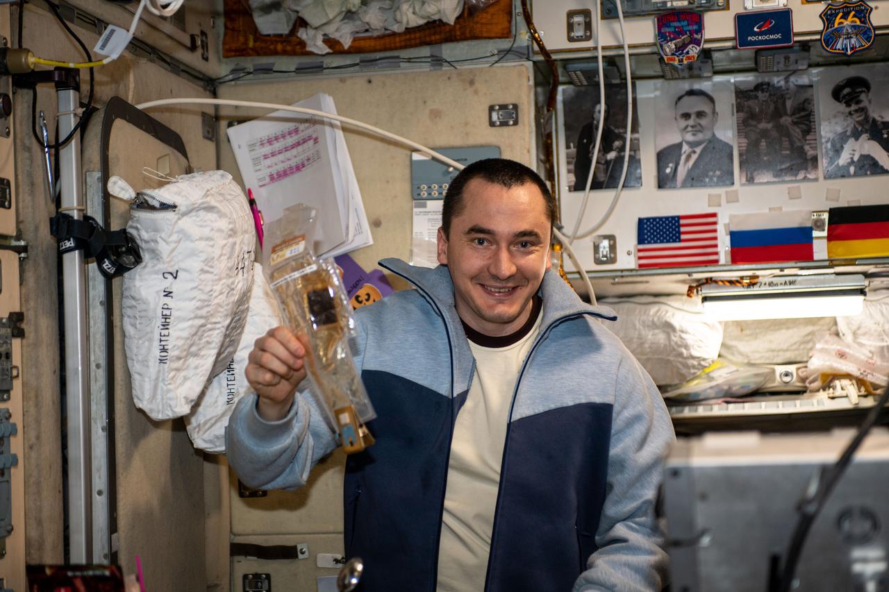 iss066e077821 (Nov. 16, 2021) --- Roscosmos cosmonaut and Expedition 66 Flight Engineer Pyotr Dubrov is pictured inside the International Space Station's Zvezda service module.