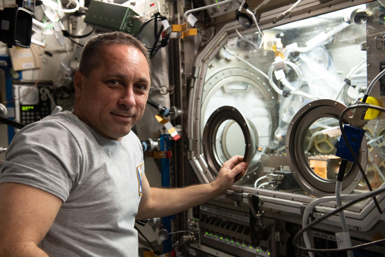 iss066e078283 (Nov. 17, 2021) ---  International Space Station Commander Anton Shkaplerov of Roscosmos works on the SUBSA-BRAINS (BRazing of Aluminum alloys IN Space) space physics experiment taking place inside the Microgravity Science Glovebox. The study examines differences in capillary flow, interface reactions, and bubble formation during solidification of brazing alloys in microgravity.