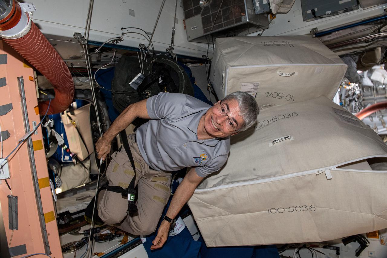 iss066e078601 (Nov. 18, 2021) --- NASA astronaut and Expedition 66 Flight Engineer Mark Vande Hei participates in maintenance and cargo activities inside the International Space Station's Unity module.