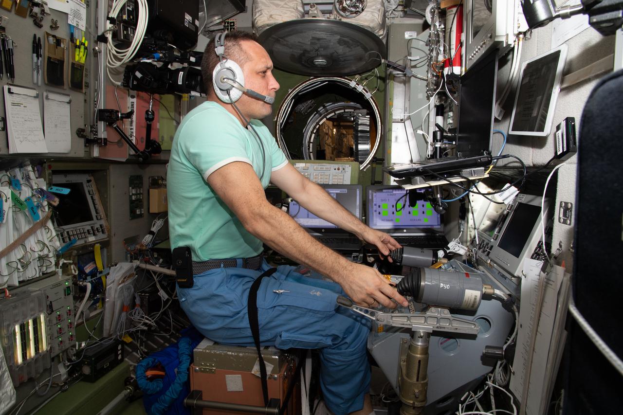 iss066e078864 (Nov. 22, 2021) --- Roscosmos cosmonaut and Expedition 66 Commander Anton Shkaplerov trains on a computer in the Zvezda service module for the approach and docking of the Prichal docking module to the Nauka multipurpose laboratory module. Dubrov practiced on Zvezda’s tele-robotically operated rendezvous unit (TORU) for the unlikely event he would have to manually dock Prichal attached to the Progress delivery craft.