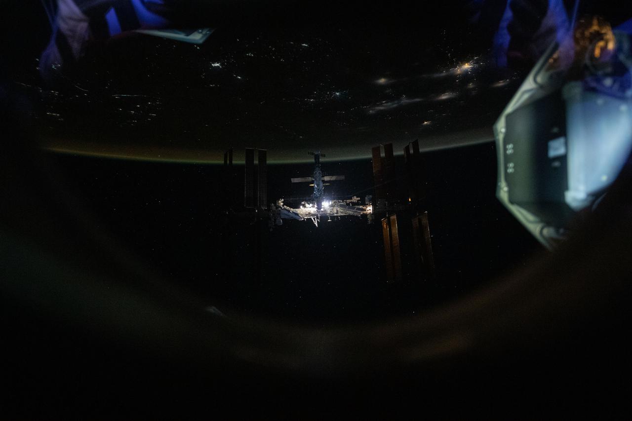 iss066e080097 (Nov. 8, 2021) --- The International Space Station is pictured from the SpaceX Crew Dragon Endeavour during a fly around of the orbiting lab that took place following its undocking from the Harmony module’s space-facing port on Nov. 8, 2021. The orbital complex was flying 264 miles above the African nation of Mali when this photograph was taken.