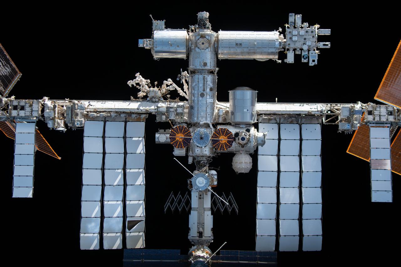 iss066e080360 (Nov. 8, 2021) --- The International Space Station is pictured from the SpaceX Crew Dragon Endeavour during a flyaround of the orbiting lab that took place following its undocking from the Harmony module’s space-facing port on Nov. 8, 2021.