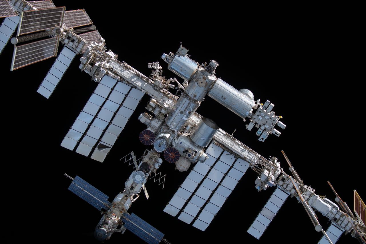 iss066e080440 (Nov. 8, 2021) --- The International Space Station is pictured from the SpaceX Crew Dragon Endeavour during a flyaround of the orbiting lab that took place following its undocking from the Harmony module’s space-facing port on Nov. 8, 2021.
