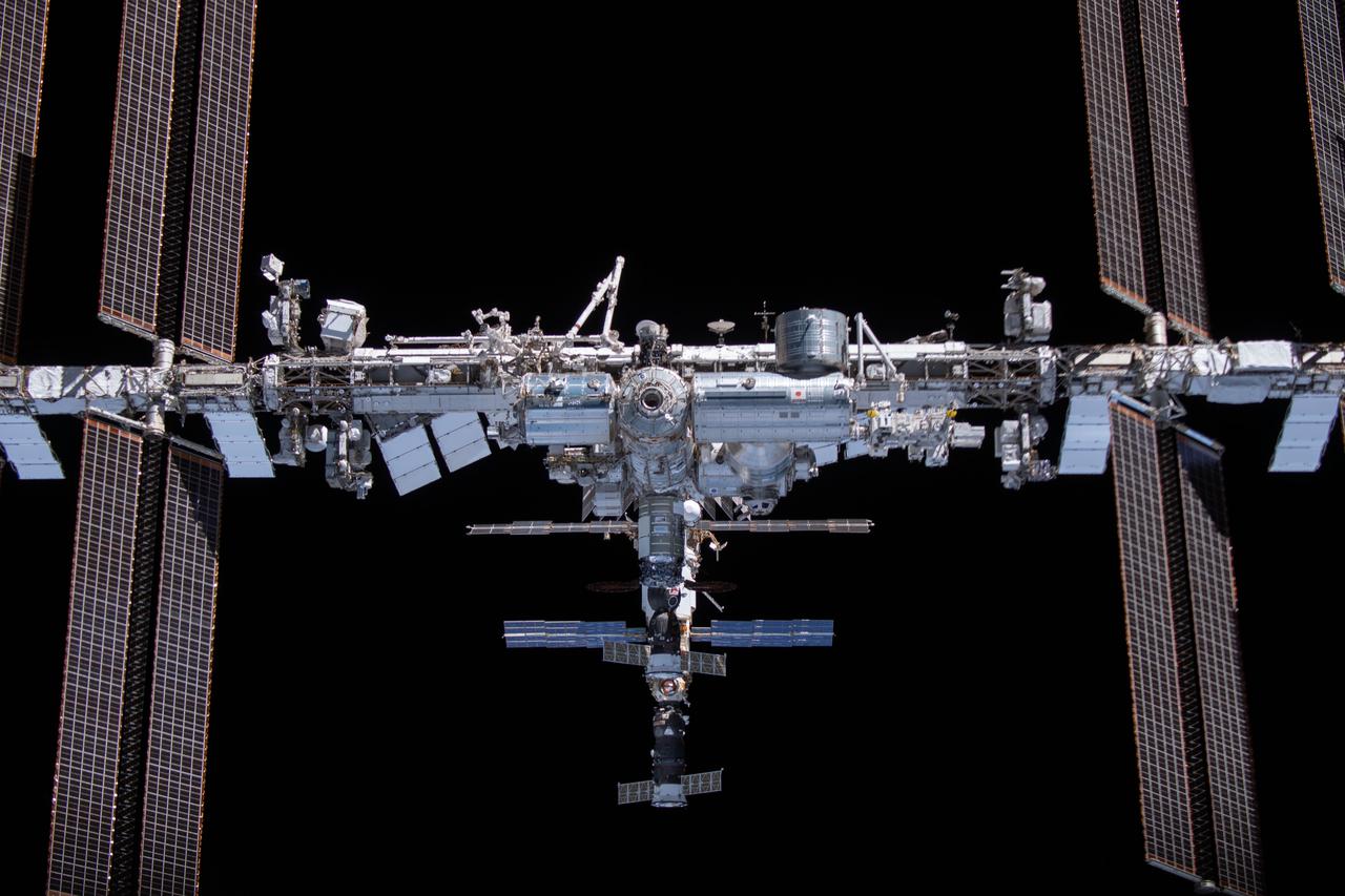 iss066e080762 (Nov. 8, 2021) --- The International Space Station is pictured from the SpaceX Crew Dragon Endeavour during a flyaround of the orbiting lab that took place following its undocking from the Harmony module’s space-facing port on Nov. 8, 2021.