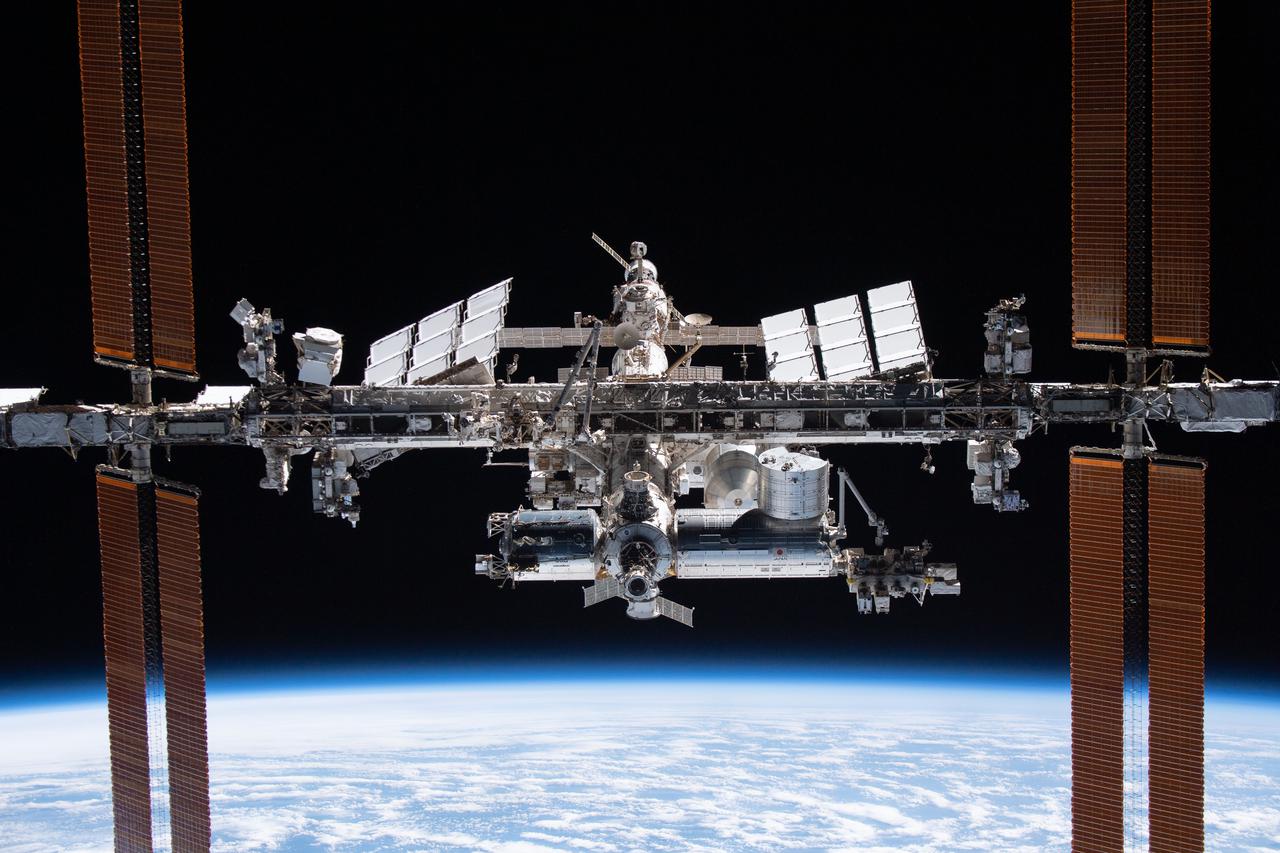 iss066e081130 (Nov. 8, 2021) -- The International Space Station is pictured from the SpaceX Crew Dragon Endeavour during a fly around of the orbiting lab that took place following its undocking from the Harmony module’s space-facing port on Nov. 8, 2021. The orbital complex was flying 263 miles above the Marshall Islands in the Pacific Ocean when this photograph was taken.