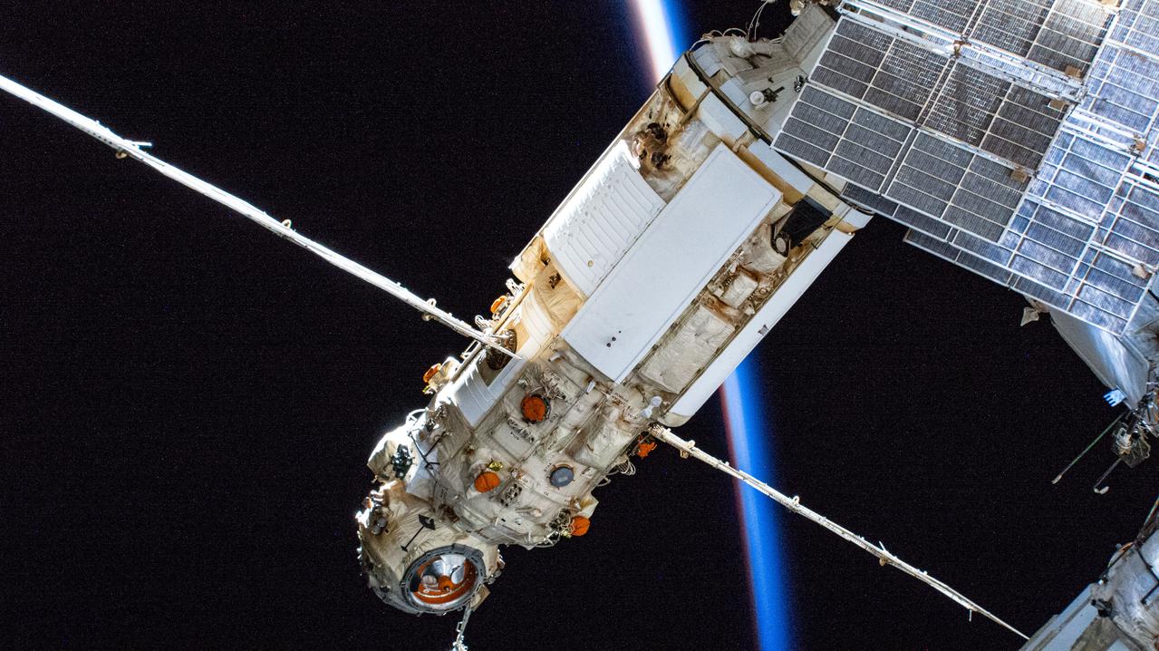 iss066e083228 (Nov. 26, 2021) --- Russia's Nauka multipurpose laboratory module is pictured as the International Space Station flew into an orbital sunset 267 miles above North America.