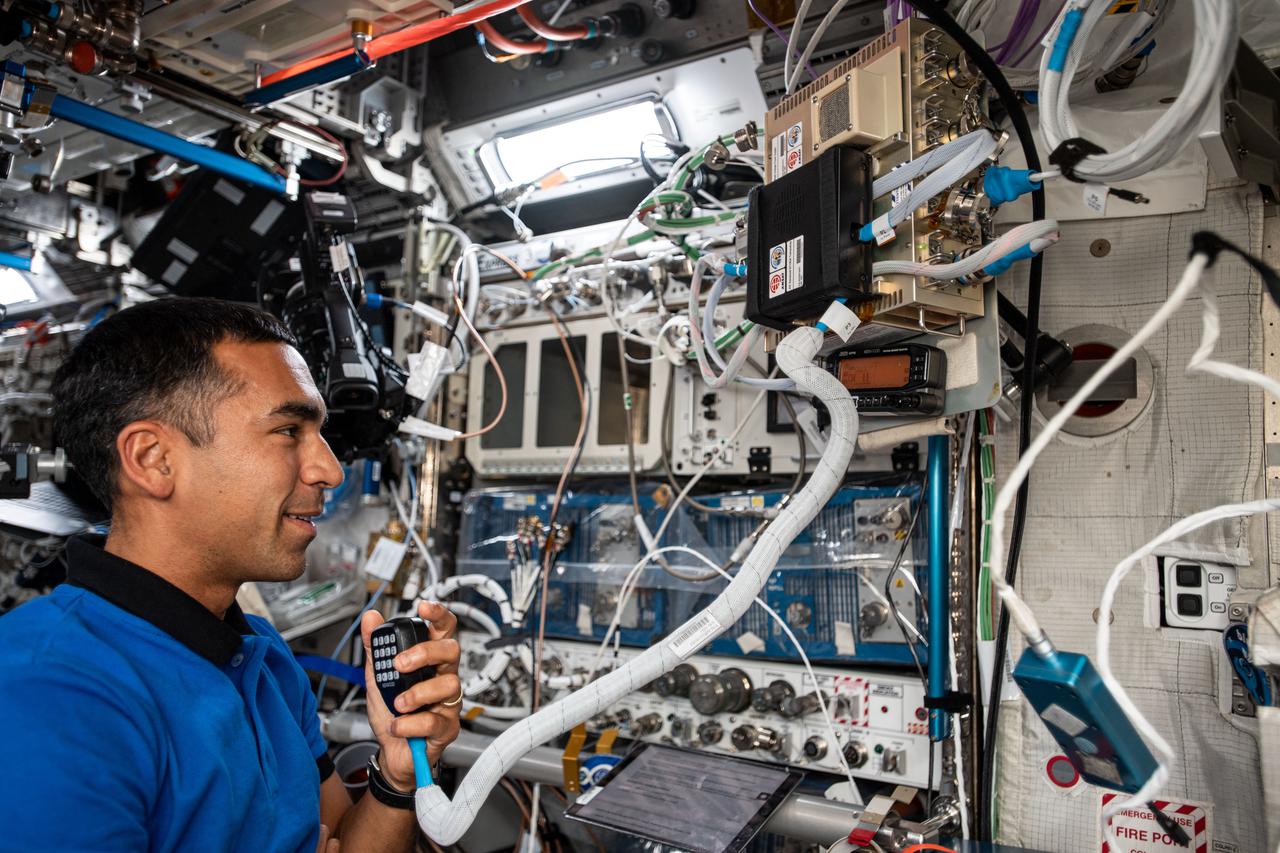 iss066e084425 (Nov. 29, 2021) --- NASA astronaut and Expedition 66 Flight Engineer Raja Chari conducts a ham radio session aboard the International Space Station with students from Temuco, Chile.