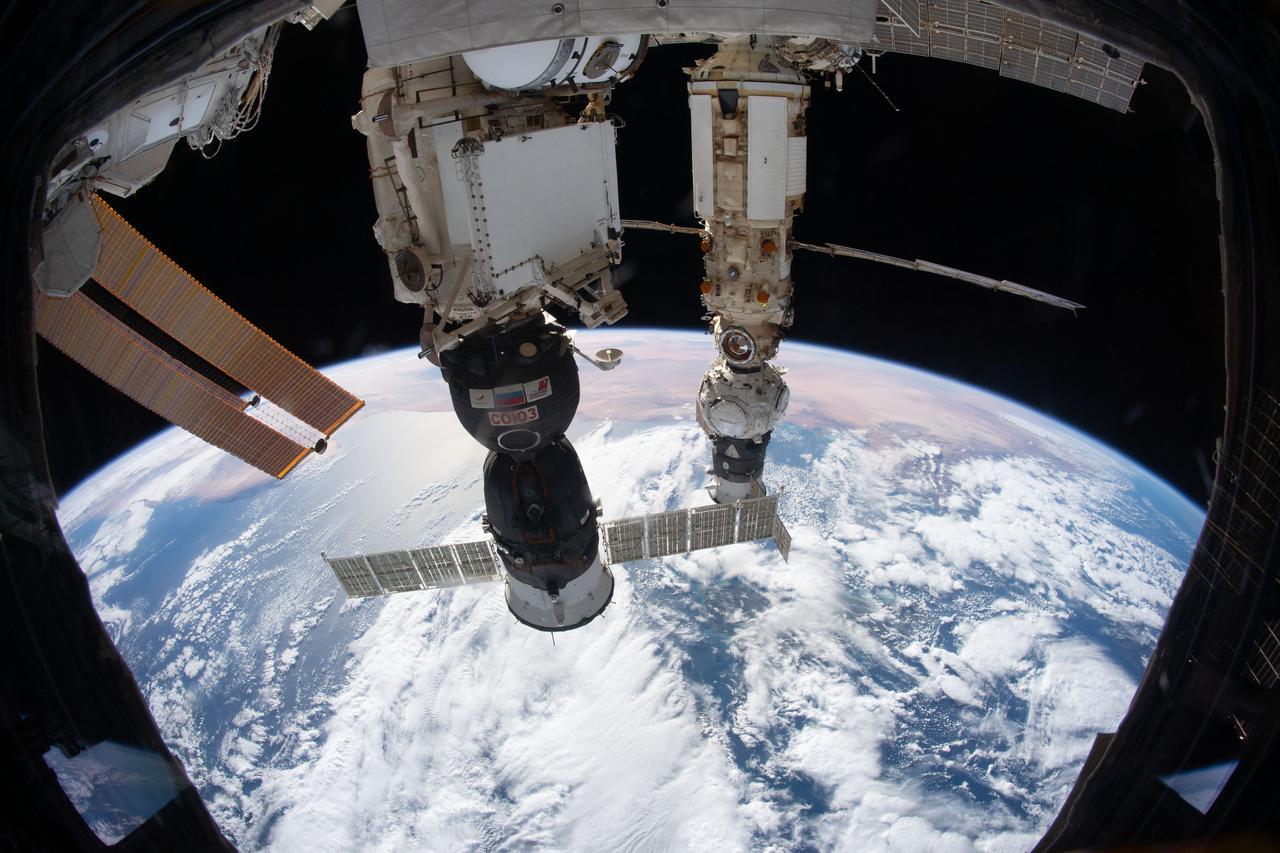 iss066e086734 (Dec. 6, 2021) --- Pictured as the International Space Station orbited 264 miles above the Tyrrhenian Sea are the Soyuz MS-19 crew ship docked to the Rassvet module and the Prichal module, still attached to the Progress delivery craft, docked to the Nauka multipurpose module.