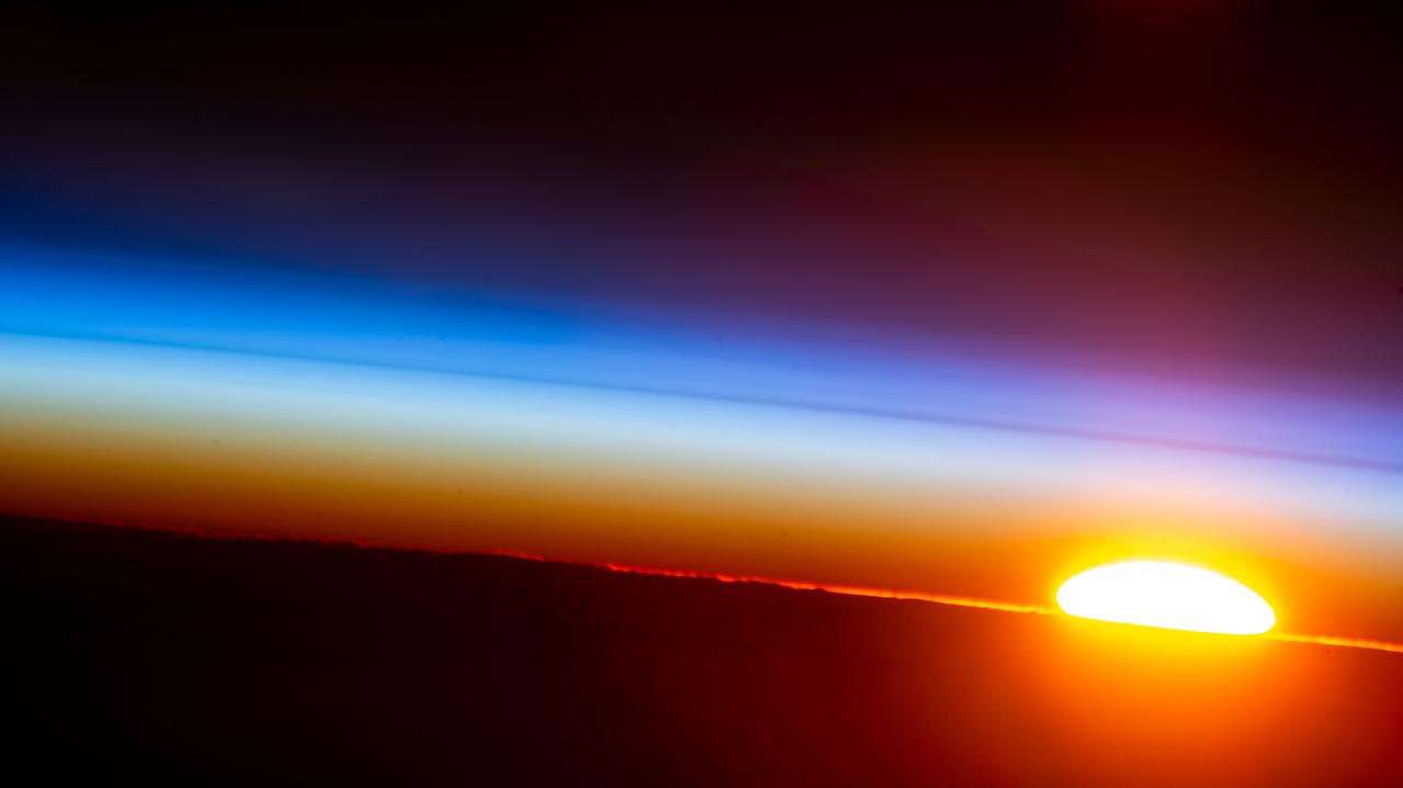 iss066e091822 (Dec. 17, 2021) --- An orbital sunrise is pictured from the International Space Station as it orbited 262 miles above Bolivia on the South American continent.