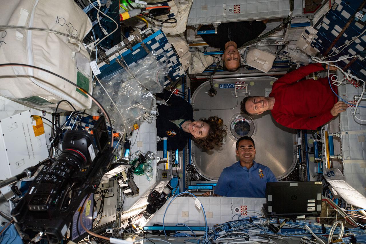 iss066e093684 (Dec. 20, 2021) --- Clockwise from bottom, are NASA astronauts Raja Chari, Kayla Barron and Thomas Marshburn with ESA (European Space Agency) astronaut Matthias Maurer are pictured during a playful portrait aboard the International Space Station.