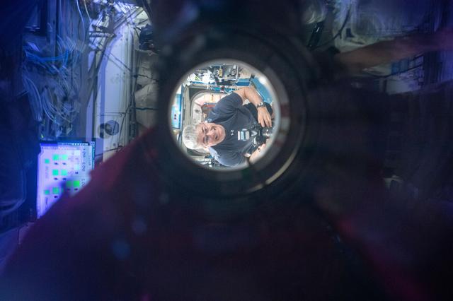 NASA image: View of Vande Hei through Hatch Window