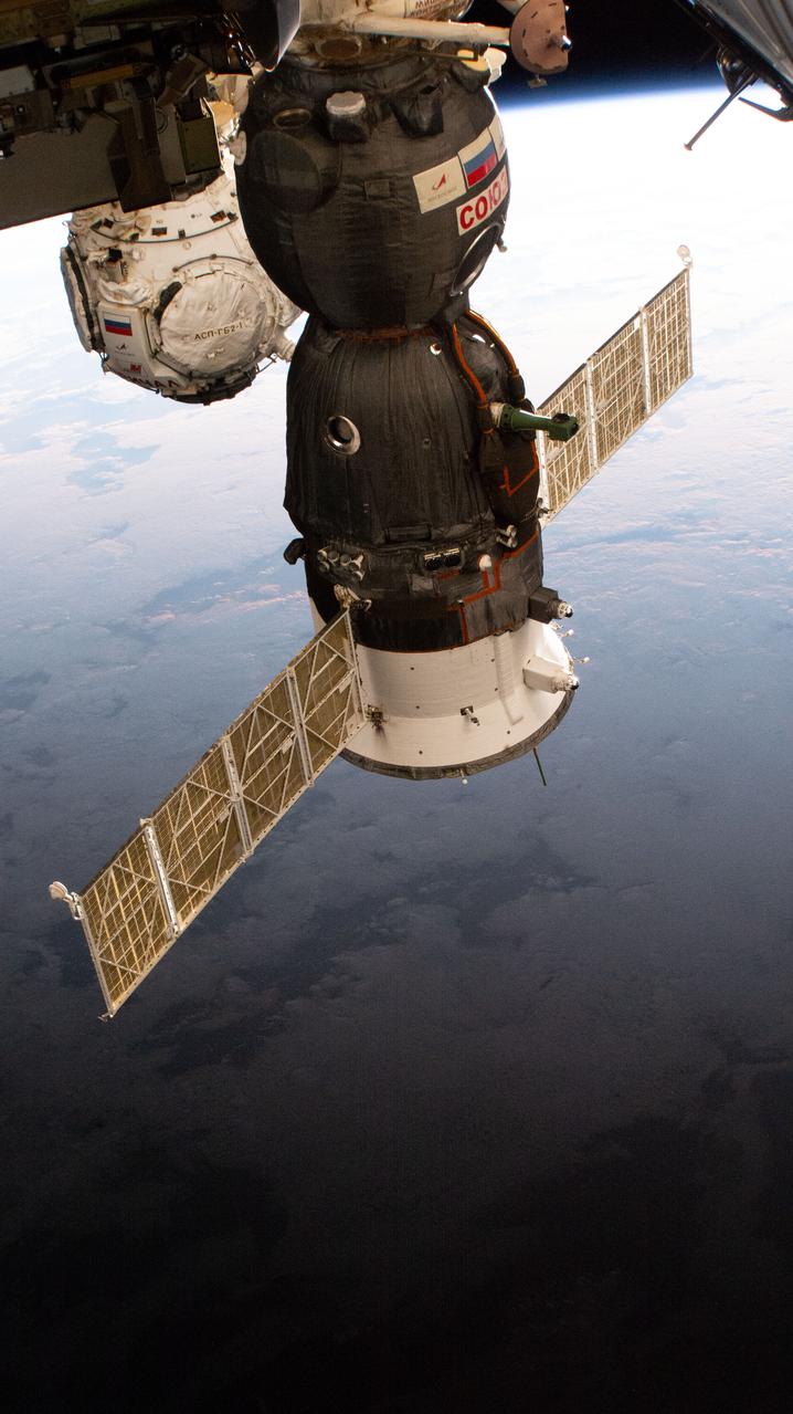 iss066e109862 (Jan. 9, 2022) --- The Soyuz MS-19 crew ship and the Prichal docking module (background) are pictured as the International Space Station orbited 260 miles above the Pacific Ocean off the coast of Peru.