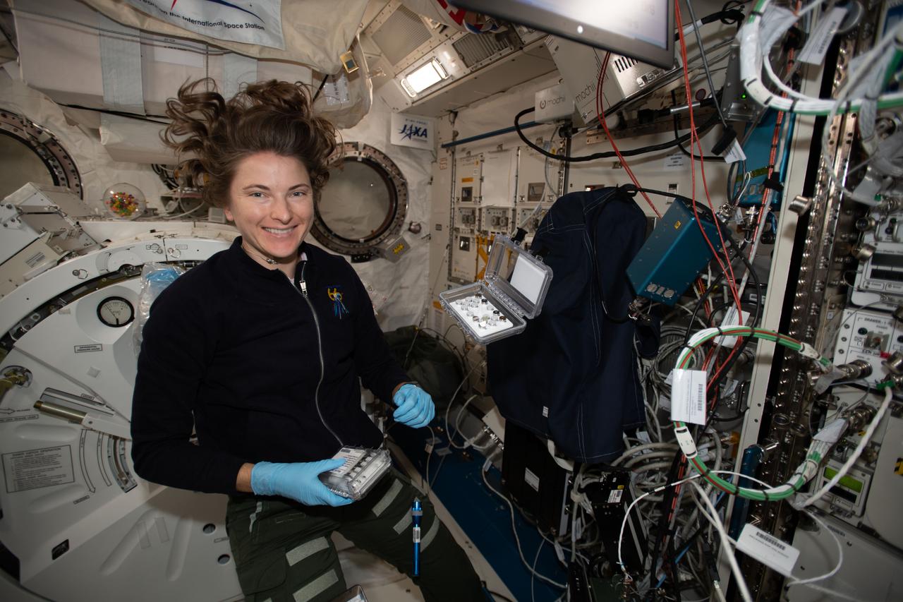 iss066e110556 (1/10/2022) --- NASA astronaut Kayla Barron sets up the Mochii microscope. Mochii is a miniature scanning electron microscope (SEM) with spectroscopy to conduct real-time, on-site imaging and compositional measurements of particles on the International Space Station (ISS).