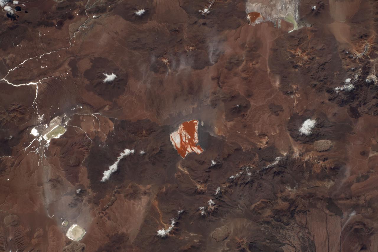 iss066e110899 (Jan. 7, 2022) --- (From left) Laguna Capina and Laguna Colorada are pictured in the Andes Mountain range in the southern portion of Bolivia.