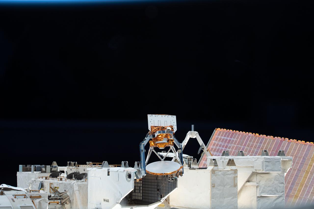 iss066e113950 (1/15/2022) --- A view of the STP-H8-COWVR aboard the International Space Station (ISS). The Space Test Program-Houston 8-Compact Ocean Wind Vector Radiometer (STP-H8-COWVR) demonstrates on-orbit use of a new terrestrial microwave meterological sensor designed to deliver accurate sea surface wind direction and speed data .