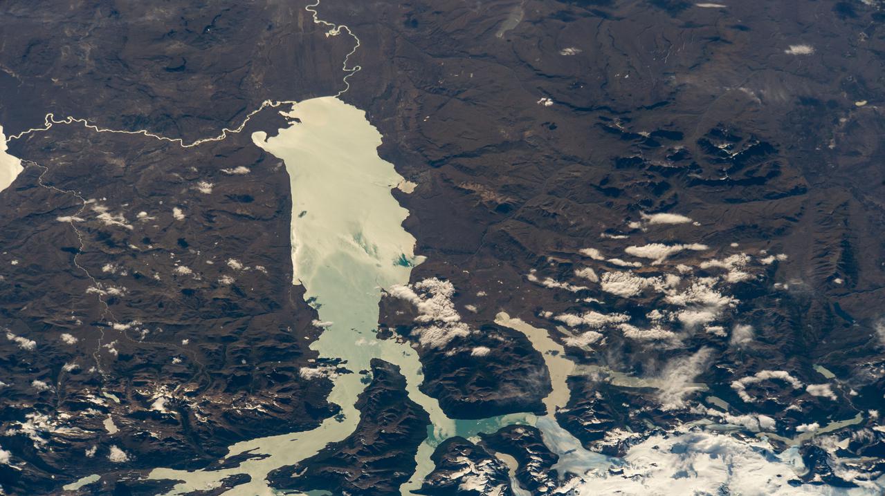 iss066e123382 (Jan. 21, 2022) --- Lago Argentino, on the eastern side of the Andes Mountians in southern Argentina, is pictured from the International Space Station as it orbited 272 miles above the Pacific Ocean.