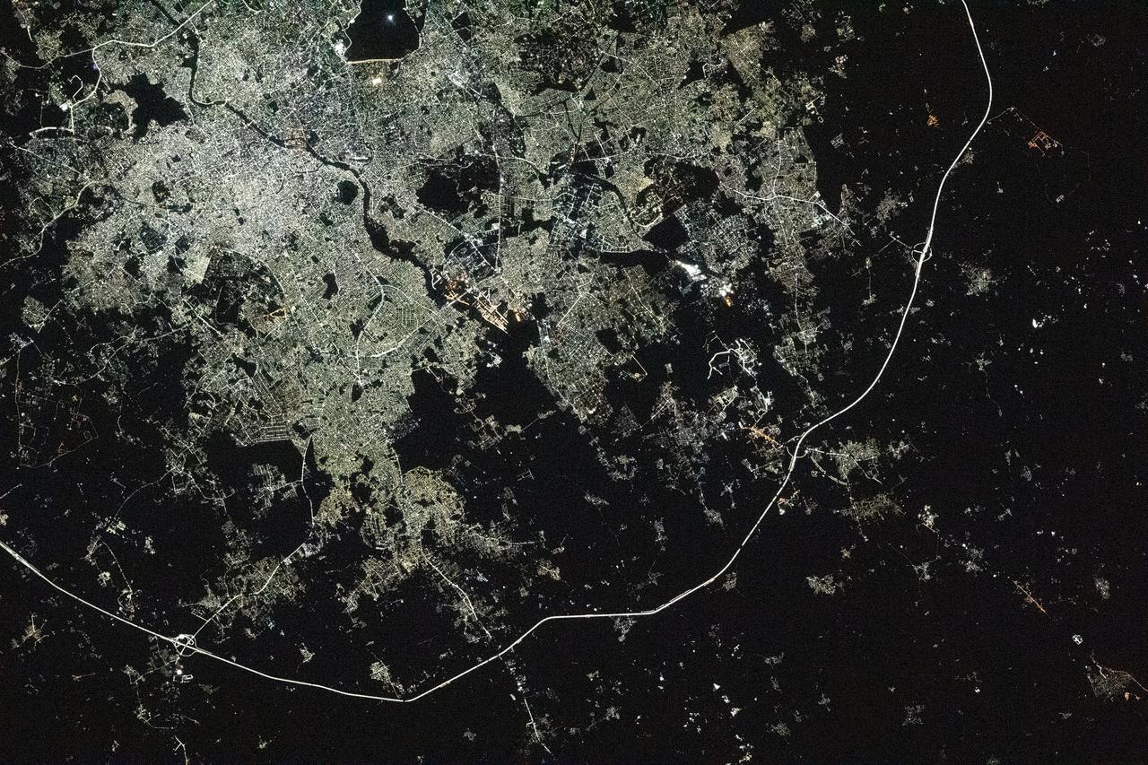 iss066e152177 (Feb. 23, 2022) --- The city lights of Hyderabad, India, bordered by Nehru Outer Ring Road, are pictured from the International Space Station as it orbited 261 miles above the South Asian subcontinent.