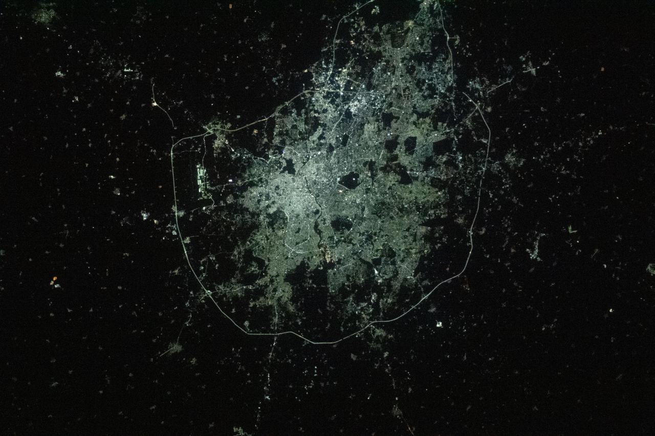 iss066e154504 (Feb. 27, 2022) --- The city lights of Hyderabad, India, bordered by Nehru Outer Ring Road, are pictured from the International Space Station as it orbited 262 miles above the South Asian subcontinent.