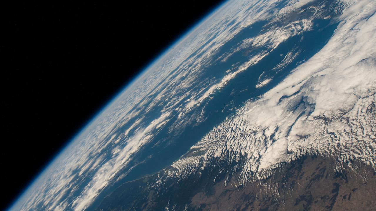 iss066e161292 (March 11, 2022) --- The cloudy, southeast coast of Australia is pictured from the International Space Station as it orbited 264 miles above Adelaide, New South Wales.