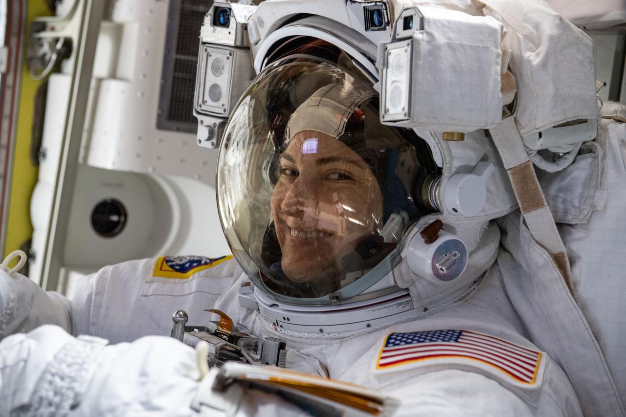 iss066e163008 (March 15, 2022) --- NASA astronaut Kayla Barron is pictured inside the U.S. Quest airlock suited up and preparing for a six-hour and 54-minute spacewalk to set up the International Space Station for its next roll-out solar array.
