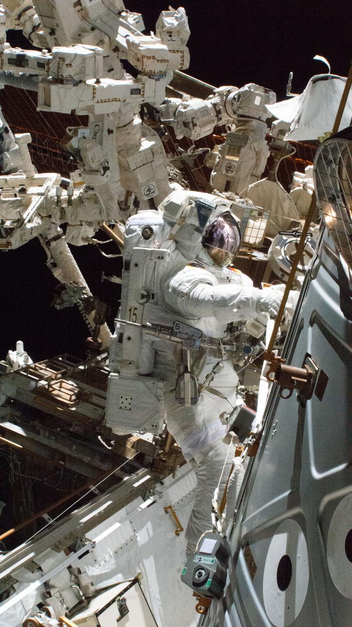 iss066e173993 (March 23, 2022) --- Astronaut Matthias Maurer of ESA (European Space Agency) is pictured outside the International Space Station during a spacewalk to install thermal gear and electronics components on the orbiting lab.