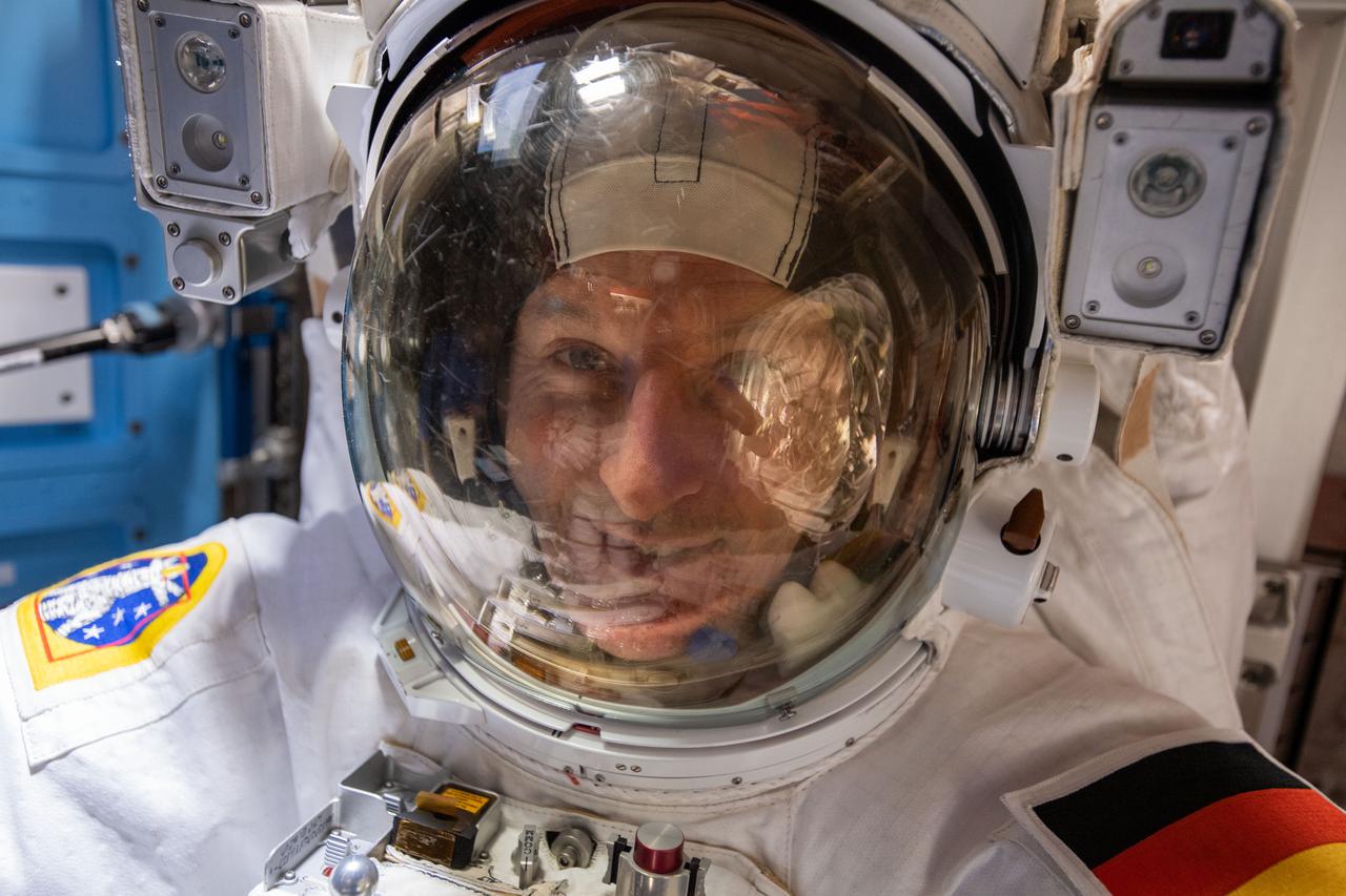 iss066e174345 (March 23, 2022) --- ESA (European Space Agency) astronaut and Expediution 66 Flight Engineer Matthias Maurer spacesuit is pictured in his U.S. spacesuit prior to beginning a spacewalk to install thermal gear and electronics components on the International Space Station.