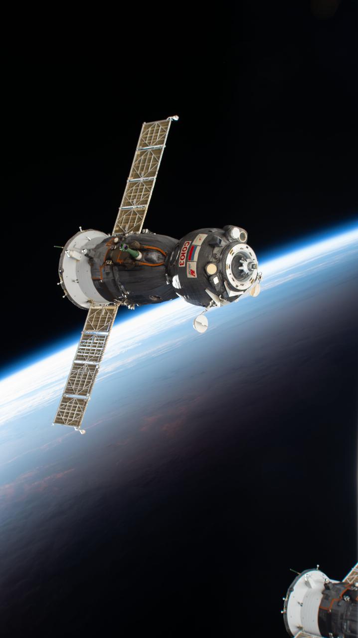 iss067e000259 (March 30, 2022) --- The Soyuz MS-19 crew ship, carrying three Expedition 66 crew members, departs the International Space Station after undocking from the Rassvet module. The Soyuz crew ship would parachute to a landing in Kazakhstan just over four hours later with NASA astronaut Mark Vande Hei and Roscosmos cosmonauts Anton Shkaplerov and Pyotr Dubrov.