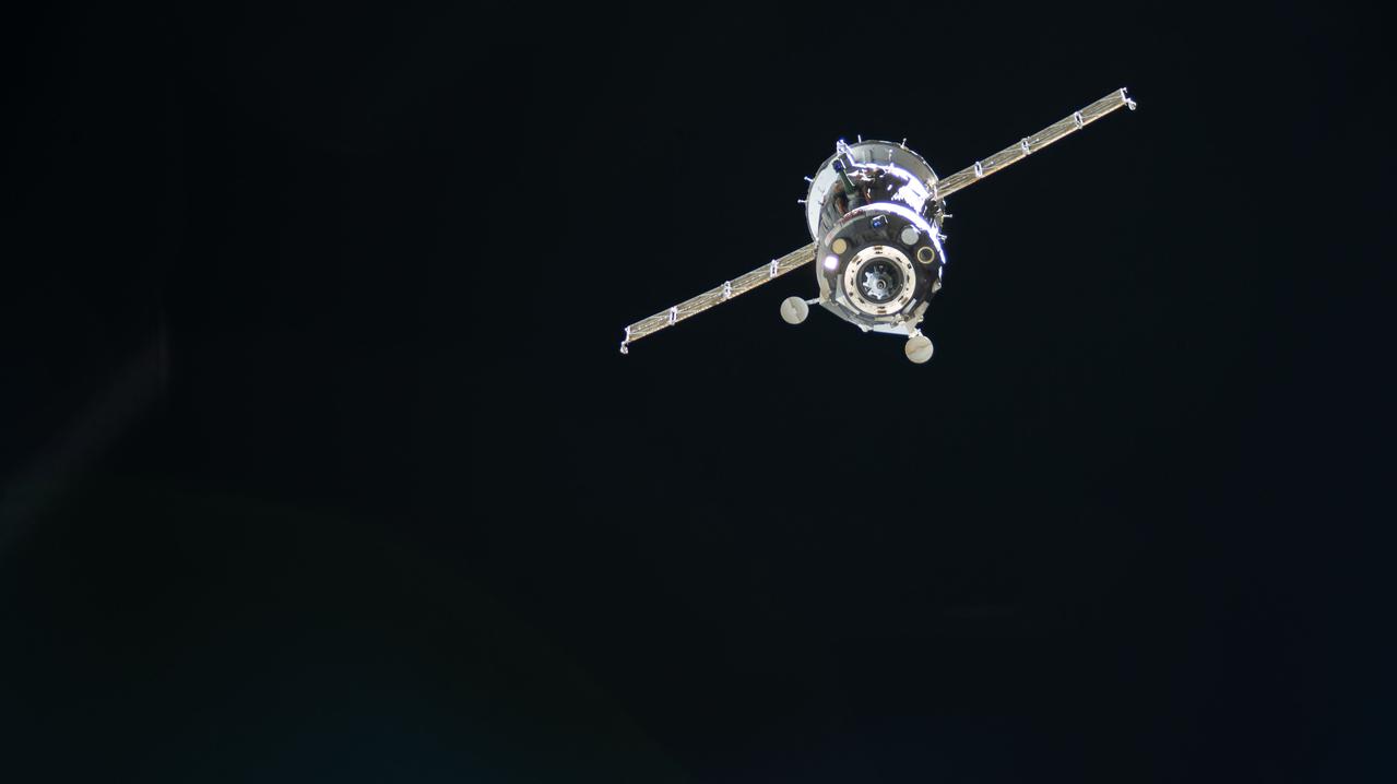 iss067e000260 (March 30, 2022) --- The Soyuz MS-19 crew ship, carrying three Expedition 66 crew members, departs the International Space Station after undocking from the Rassvet module. The Soyuz crew ship would parachute to a landing in Kazakhstan about four hours later with NASA astronaut Mark Vande Hei and Roscosmos cosmonauts Anton Shkaplerov and Pyotr Dubrov.