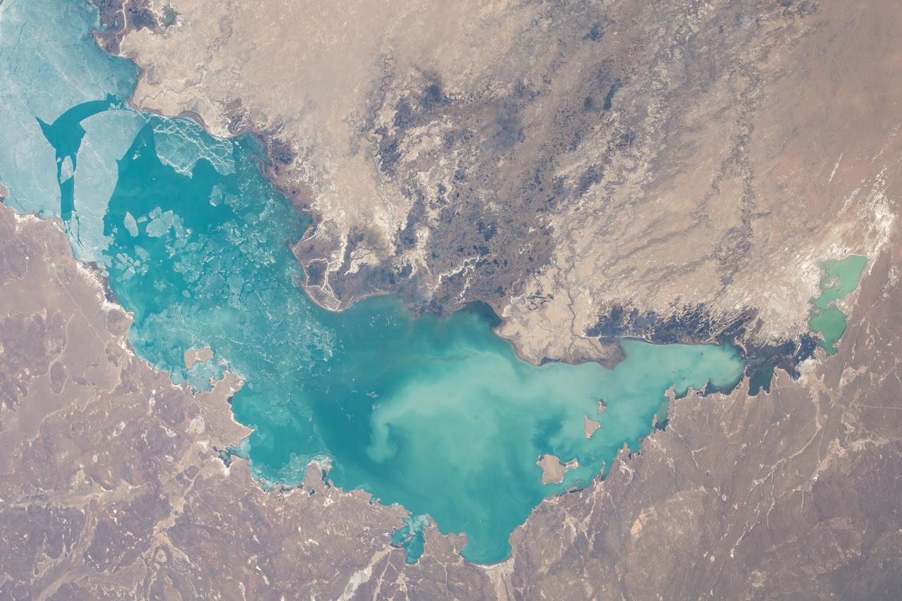iss067e003542 (April 5, 2022) --- Lake Baikhash in Kazakhstan is pictiured from the International Space Station as it orbited 261 miles above the Central Asian nation.