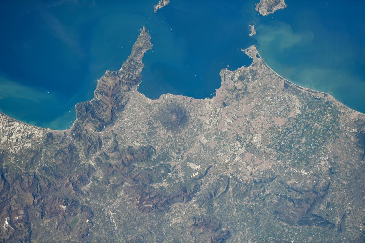 iss067e010622 (April 12, 2022) --- Mount Vesuvius on the Gulf of Naples in Italy is pictured from the International Space Station as it orbited 260 miles above