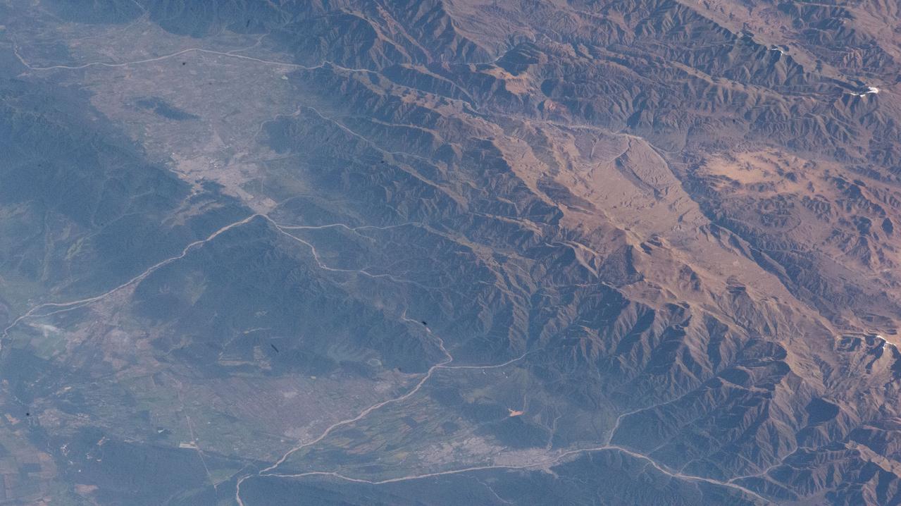 iss067e029174 (April 22, 2022) --- Several cities in the mountainous northwestern region of Argentina are pictured from the International Space Station as it orbited 264 miles above.