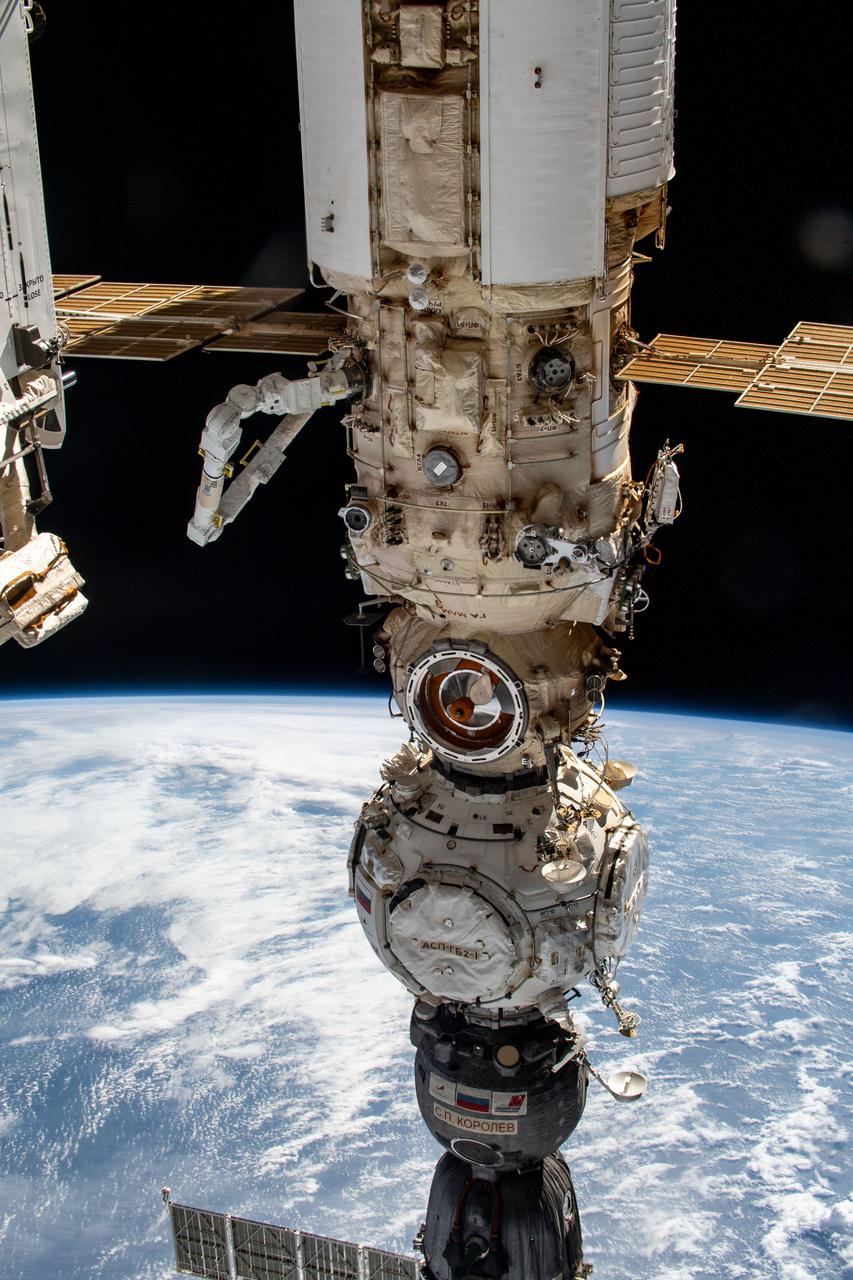iss067e032334 (April 29, 2022) --- From top to bottom, the Nauka multipurpose laboratory module, the Prichal docking module, and the Soyuz MS-21 crew ship are pictured attached to the Russian segment of the International Space Station. Visible at upper left, is the new European robotic arm attached to Nauka.