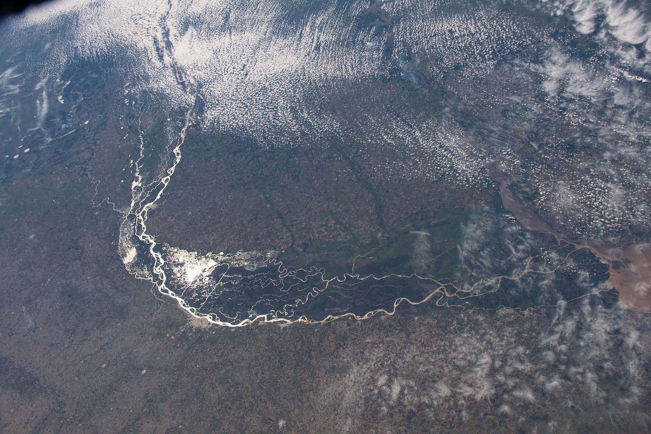 iss067e034812 (May 5, 2022) --- The Paraná River, pictured from the International Space Station at an altitude of 269 miles, leads into the Paraná Delta and empties into the Rio de la Plata which separates Argentina from Uruguay on South America's Atlantic coast. The fertile lowlands region is also known as the Pampas.