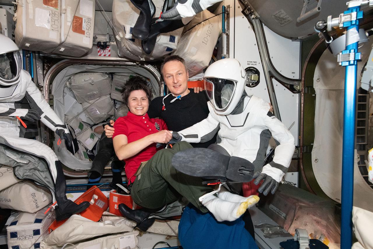 iss067e035525 (May 4, 2022) --- Fellow ESA (European Space Agency) astronauts Samantha Cristoforetti and Matthias Maurer pose for a portrait inside the International Space Station's Harmony module. Maurer would don his SpaceX flight suit later, board the Dragon Endurance crew ship and depart for Earth.