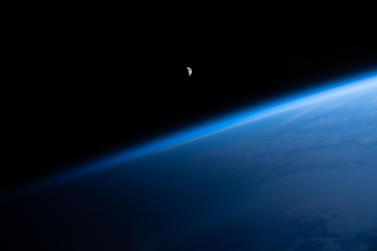 iss067e035826 (May 8, 2022) --- The waning crescent Moon is pictured from the International Space Station as it flew into an orbital sunrise 260 miles above the Atlantic Ocean off the northwest coast of the United States.