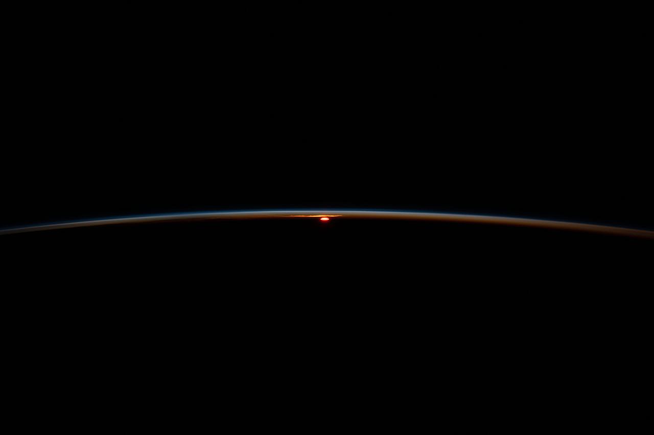 iss067e036271 (May 7, 2022) --- The International Space Station flies into an orbital sunset at an altitude of 266 miles above the Atlantic Ocean off the coast of South Africa.