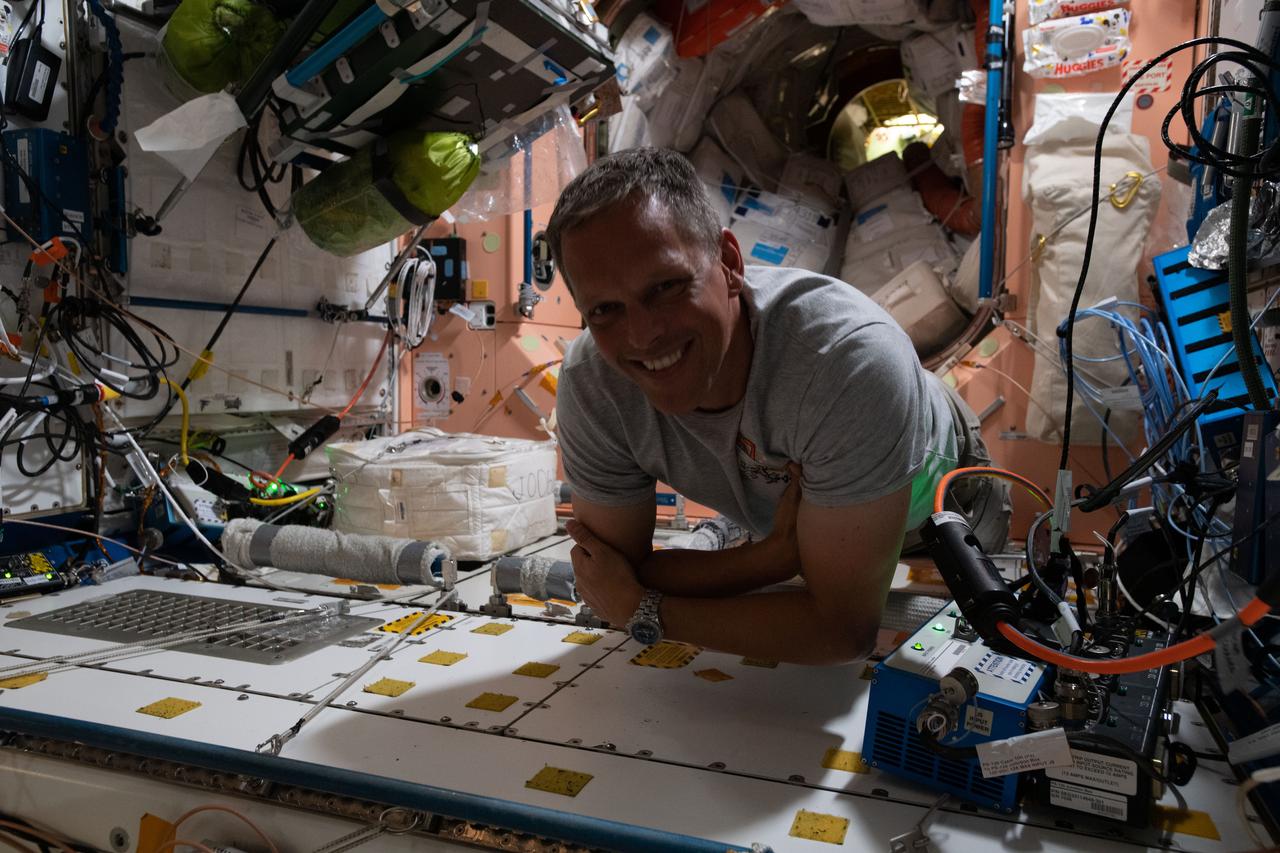 iss067e043382 (May 14, 2022) --- NASA astronaut and Expedition 67 Flight Engineer Bob Hines is pictured during maintenance activities inside the International Space Station's Unity module.