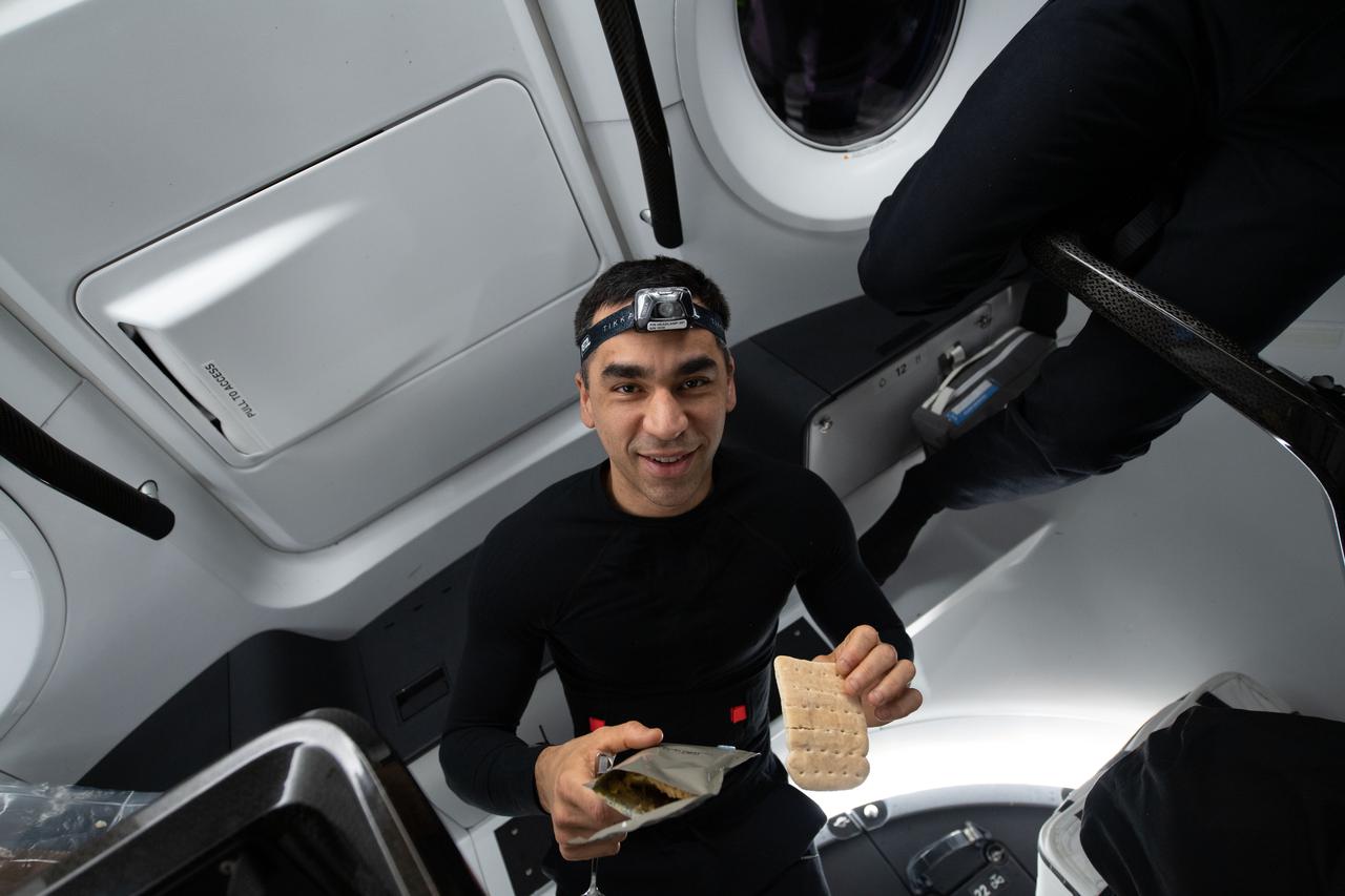 iss067e075881 (May 5, 2022) --- Crew-3 Commander Raja Chari of NASA is pictured journeying back to Earth inside the SpaceX Dragon Endurance spacecraft following its undocking from the International Space Station.