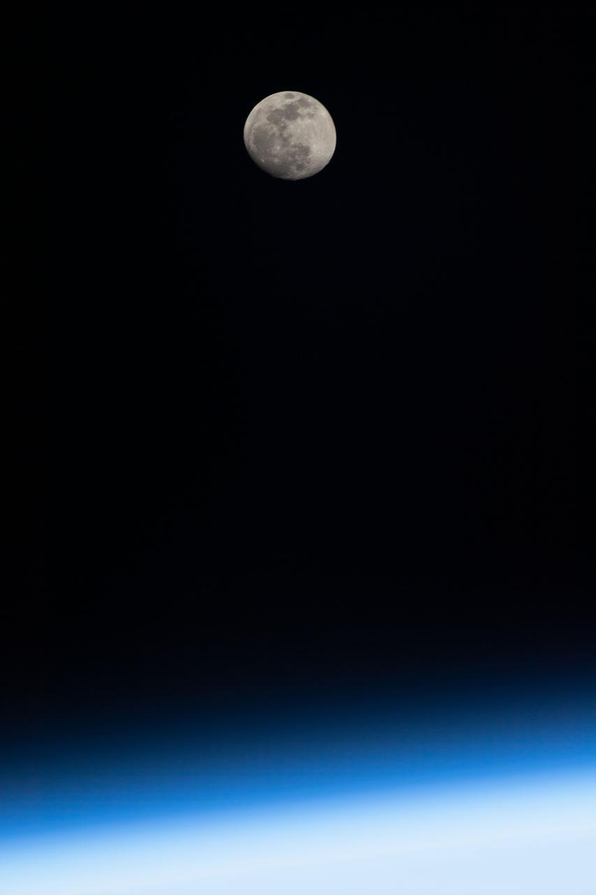 iss067e123467 (June 12, 2022) --- The waxing gibbous Moon is photographed above Earth's horizon from the International Space Station as it orbited 261 miles above Turkey.