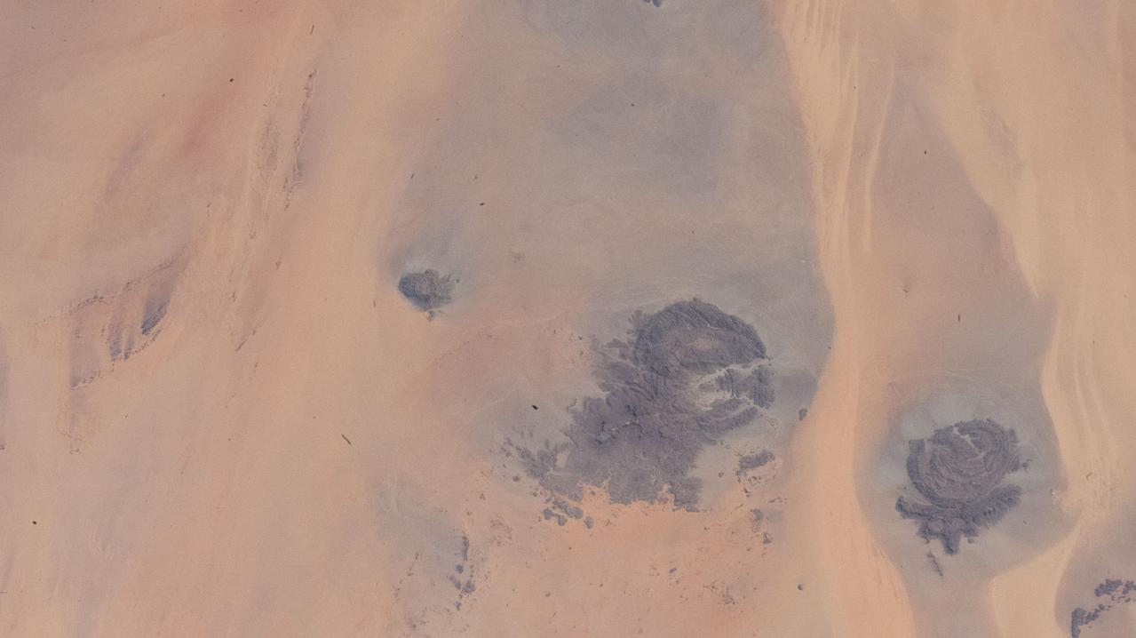 iss067e141205 (June 19, 2022) --- This portion of the Western Desert is an area of the Sahara where the borders of Egypt, Libya, and Sudan meet. The International Space Station was orbiting 259 miles above north Africa at the time of this photograph.